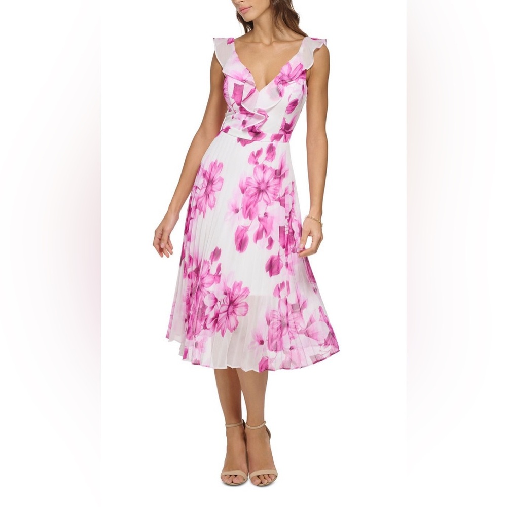 Perfect to wear to a wedding or party! Lovely Pink and white Dress. Worn once!